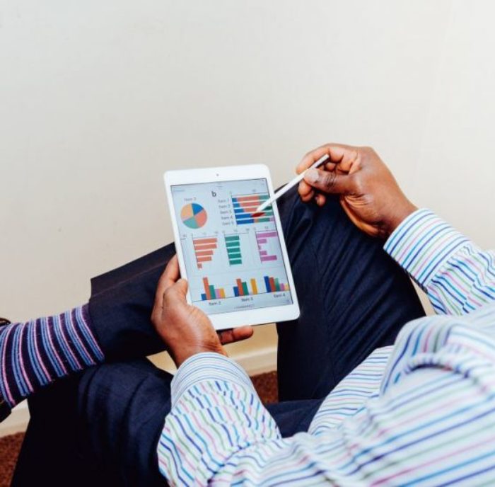 Man browsing on tablet