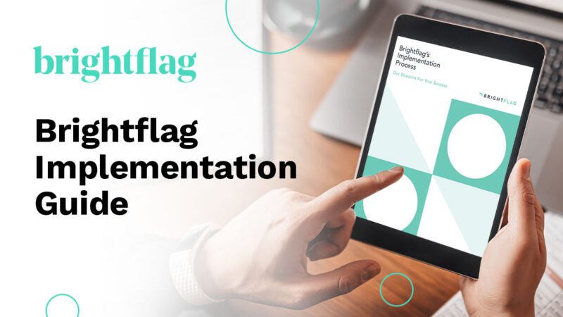 Photo of a person viewing the Brightflag Implementation Guide on their tablet, with the Brightflag logo in the upper left corner.