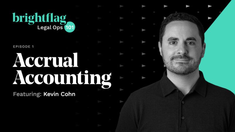 Brightflag Chief Growth Officer Kevin Cohn in black-and-white, standing in front of a black background with a 